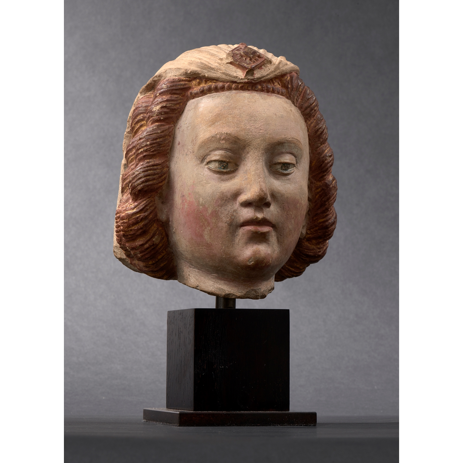 HEAD OF A WOMAN NORMANDY EARLY 16TH CENTURY