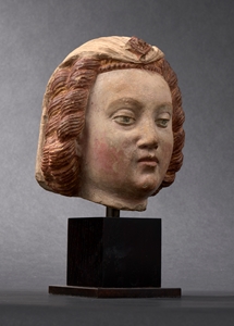 HEAD OF A WOMAN NORMANDY EARLY 16TH CENTURY