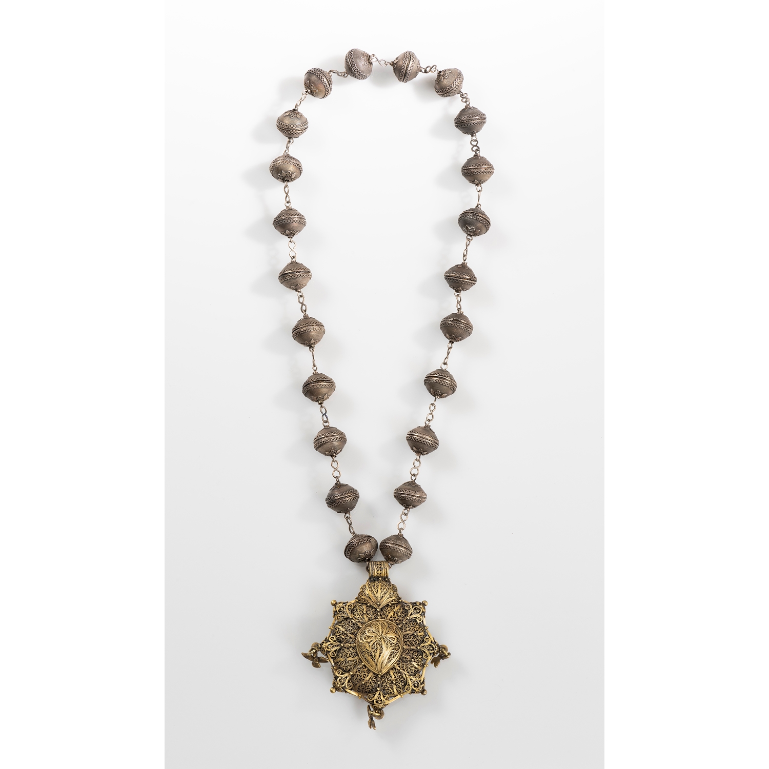 UNIQUE NECKLACE COMPOSED OF A SICILIAN MONUMENTAL PROCESSION ROSARY AND A CASTILLAN PENDANT FROM A TRADITIONAL COSTUME