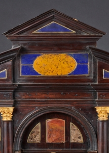 AN ITALIAN BAROQUE "PIETRE DURE" INLAID PRIVATE DEVOTIONAL ALTARPIECE WITH A BRONZE-GILT ALLEGORY OF CHARITY AFTER ALGARDI (1595-1654)